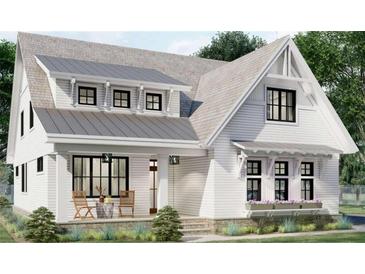 Charming two-story home with white siding, black windows, covered porch and inviting curb appeal at 6821 Phillips Mill Rd, Douglasville, GA 30135