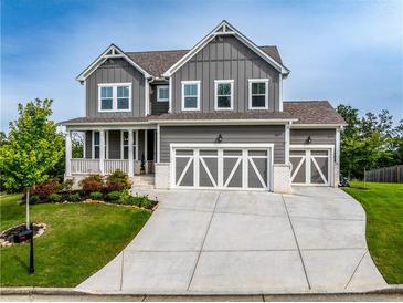 Beautiful two-story home with gray siding, white trim, and well-manicured lawn at 17 Ridgeline Nw Way, Cartersville, GA 30121