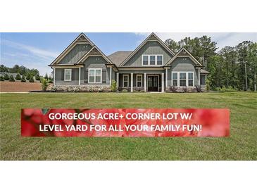 Charming two-story home with an acre of level yard and craftsman-style details at 485 Discovery Lake Dr, Fayetteville, GA 30215