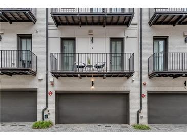 Modern townhome featuring private garages and balconies at 574 Boulevard Ne Pl # 4, Atlanta, GA 30308