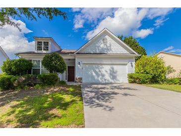 Charming one-story home featuring a two-car garage and well-maintained landscaping at 7161 Boulder Pass, Union City, GA 30291