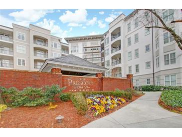 Community entrance to The Prescott at Park Place Luxury Condominiums with manicured flowerbeds at 11 Perimeter E Ctr # 1402, Dunwoody, GA 30346