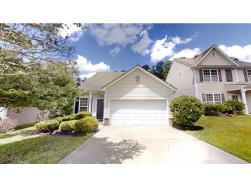 Charming single-Gathering home features a two-car garage and well-maintained landscaping at 3827 Shenfield Dr, Union City, GA 30291