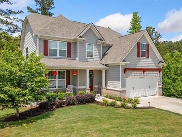 Charming two-story home with gray siding, red shutters, and a well-manicured lawn at 33 New Kent Ct, Villa Rica, GA 30180