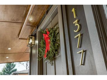 Inviting front door adorned with a festive wreath and clear house numbers for a welcoming touch at 1377 Dorothy Dr, Decatur, GA 30030