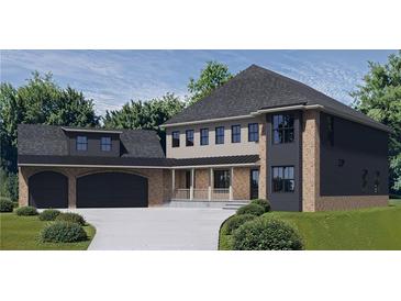 Stunning two-story home with a three-car garage, brick and siding details, and a covered front porch at 1330 Twelve Oaks Nw Cir, Atlanta, GA 30327