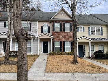 Charming townhouses featuring varied facades and well-maintained landscaping at 20 Pine Canyon Sw Dr # 41, Atlanta, GA 30331
