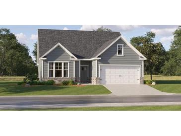 Charming single-Gathering home with gray siding, stone accents, a well-manicured lawn, and an attached two-car garage at 84 Mayhaw Pt, Sharpsburg, GA 30277