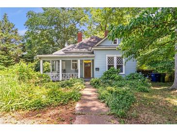 Charming home featuring a welcoming front porch and a neatly landscaped front yard at 782 Marion Se Ave, Atlanta, GA 30312