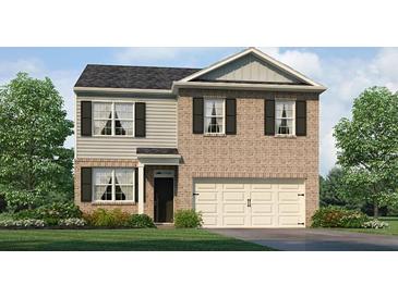 Charming two-story home featuring brick and siding, a two-car garage, and lush landscaping at 3042 Manor Hill Pl, Union City, GA 30291