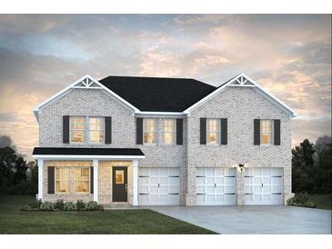 Charming two-story home with a brick facade, black roof, and a well-manicured front lawn and a two car garage at 1673 Fuma Leaf Way, Mcdonough, GA 30253