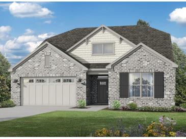 Beautiful single-Gathering home with gray brick, complemented by a lush lawn and charming landscaping at 2255 Windsor Bluffs Dr, Cumming, GA 30041