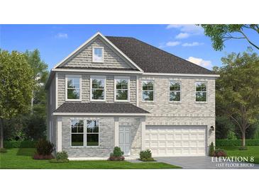 Charming two-story home featuring light brick, dormer window, and a welcoming two-car garage at 2525 Dixon Pl, Lawrenceville, GA 30045