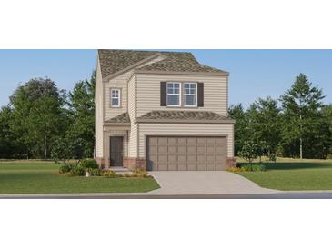 Charming two-story home with a two car garage and landscaped front yard at 2276 Linden Pass, Douglasville, GA 30135