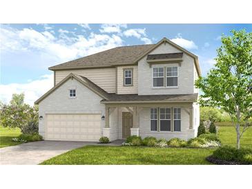 Charming two-story home features a brick and siding exterior, attached two-car garage, and manicured lawn at 1734 Fawlocke Run, Loganville, GA 30052