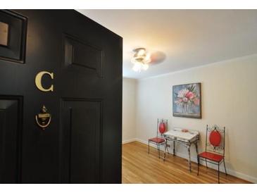 Inviting entryway featuring hardwood floors and tasteful decor, creating a warm and welcoming ambiance at 1332 Euclid Ave # C, Atlanta, GA 30307