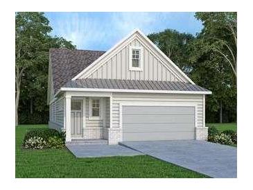 Charming one-story home boasts a neutral exterior, two-car garage, and professionally landscaped yard at 1818 Butterfly Way, Marietta, GA 30066