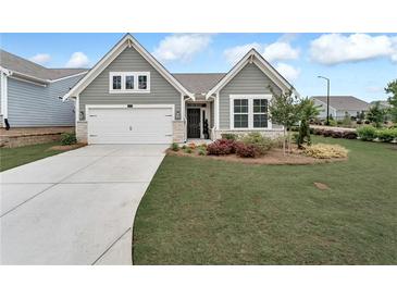 Charming single Gathering home with a well-manicured lawn and a two-car garage, perfect for suburban living at 242 Aspen Way, Dallas, GA 30157