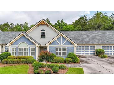 Charming single-Gathering home with well-manicured landscaping, attached garage, and beautiful curb appeal at 18 Mary Ne Ln, White, GA 30184