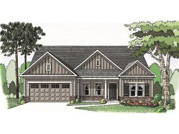 Charming single-story home with a two-car garage, brick accents, and a well-manicured front lawn at 1024 Red Oak Blvd, Loganville, GA 30052