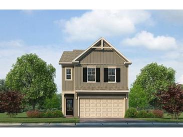 Charming two-story home with vertical siding, black shutters, well-manicured lawn, and an attached two-car garage at 1259 Riverstone Rd, Jonesboro, GA 30238