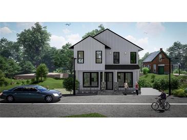 Charming two-story home with modern design, manicured landscaping, and welcoming curb appeal at 1401 Rupert Rd, Decatur, GA 30030