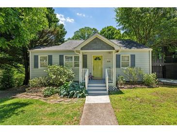 Charming cottage-style home with a welcoming front porch and a beautifully landscaped front yard at 1539 Marbut Se Ave, Atlanta, GA 30316