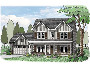 Charming two-story home with grey siding, stone foundation, shutters, and a welcoming front porch and attached garage at 1082 Cherry Bark Ct, Loganville, GA 30052