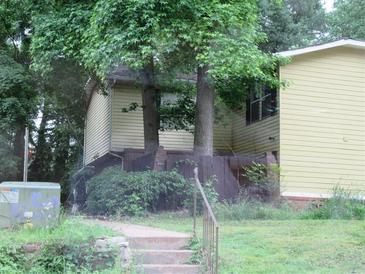 Two-story home with a well-maintained yard and mature trees in a quiet neighborhood at 1993 Whitehall Forest Ct, Atlanta, GA 30316