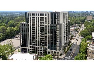 Stunning high-rise building boasts modern architecture, expansive windows, and city views at 2425 Peachtree Ne Rd # 902, Atlanta, GA 30305