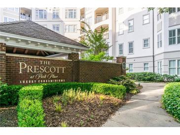 The Prescott at Park Place brick sign nestled among manicured landscaping, providing an appealing and professional community entrance at 11 Perimeter E Ctr # 1412, Atlanta, GA 30346