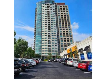 Contemporary high-rise building with convenient parking and nearby shops and amenities at 4561 Olde Perimeter Way # 608, Dunwoody, GA 30346
