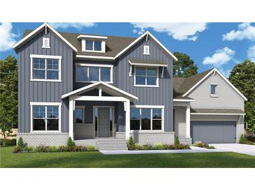 Charming two-story home features a welcoming front porch, attached two car garage, and beautiful modern design at 448 Lower Shoreline Sw Ct, Marietta, GA 30064