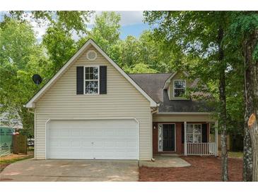 Charming home featuring a two-car garage and inviting front porch at 6 Stonebridge Se Ct, Cartersville, GA 30121