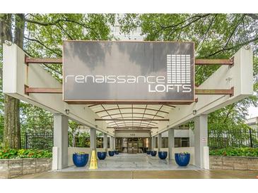 Welcoming entrance to Renaissance Lofts, showcasing modern architecture and lush landscaping at 120 Ralph Mcgill Ne Blvd # 1502, Atlanta, GA 30308