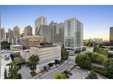 A stunning high-angle view of the building with city skyline views at 215 Piedmont Ne Ave # 1001, Atlanta, GA 30308