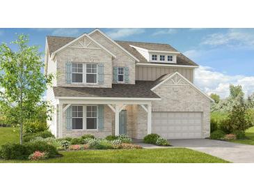 Charming two-story brick home with a manicured lawn, light blue shutters and a two-car garage at 102 Sheryl Way, Loganville, GA 30052