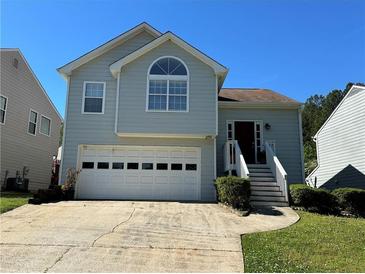 Charming two-story home with a two-car garage and well-maintained front yard at 3889 Sidney Lanier Blvd, Duluth, GA 30096