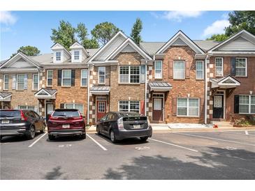 Charming townhomes feature brick facades and well-maintained landscaping at 2372 Johnson Rd, Atlanta, GA 30345