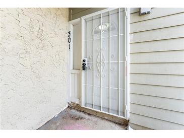 Protected front door with security gate at entry of the property at 3575 Oakvale Rd # 301, Decatur, GA 30034