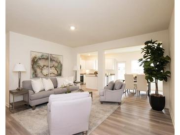 Bright living room features stylish furniture, modern decor, and an open layout at 1577 Aiden Way # 39, Conyers, GA 30013