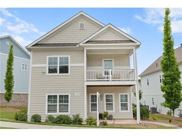 Charming two-story home with a welcoming front porch and second story balcony at 230 Fender Walk, Marietta, GA 30060
