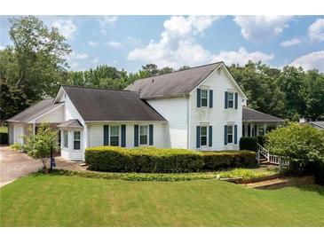 Charming two-story home with landscaped front yard and classic white siding at 2692 Wellington Dr, Marietta, GA 30062