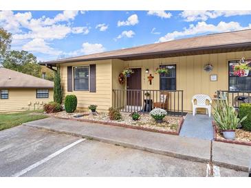 Inviting porch with colorful flowers and charming decor enhancing the curb appeal of the home at 1101 New Horizon St, Powder Springs, GA 30127