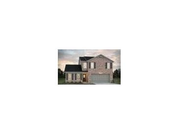 Charming two-story brick home with a dark roof, attached garage, and landscaped front yard at 5381 Tolar Rd, South Fulton, GA 30213