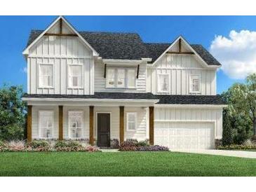Charming two-story home featuring a welcoming front porch, white siding, and a well-manicured lawn at 4710 Crestline View Rd, Cumming, GA 30028