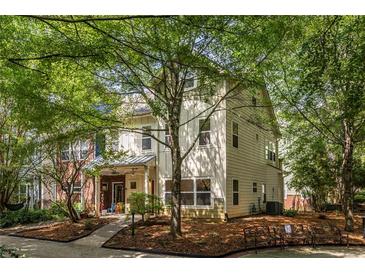Charming two-story home with well-maintained lawn and mature trees offering shade at 1001 Dancing Fox Rd, Decatur, GA 30032