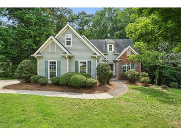 Charming home with a well-maintained lawn, offering inviting curb appeal and a cozy atmosphere at 46 Highland Ct, Carrollton, GA 30116