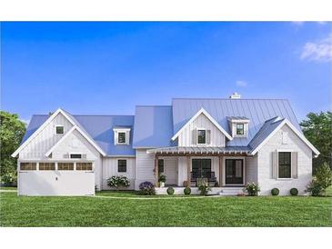 Charming two-story modern farmhouse featuring white siding, a metal roof, and a welcoming front porch with seating at 4557 Gresham Road, Douglasville, GA 30134