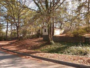Cozy home nestled among the trees with a quaint and private yard setting at 2117 Samuel Place Pl, Decatur, GA 30032